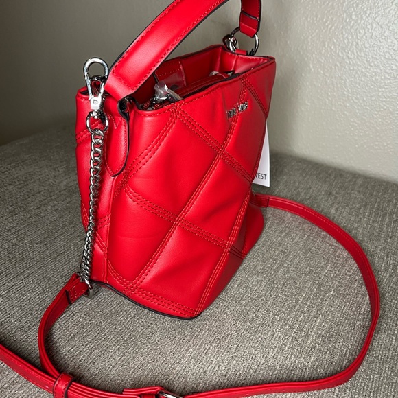 Red NineWest double-handled wallet to wear it two ways plus it's also adjustable - Picture 10 of 13